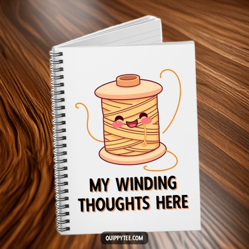 Funny notebook with a smiling spool of thread character unwinding, perfect for jotting down creative ideas.